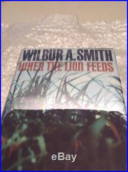Rare wilbur a smith signed when the lion feeds first edition hb in ex condition